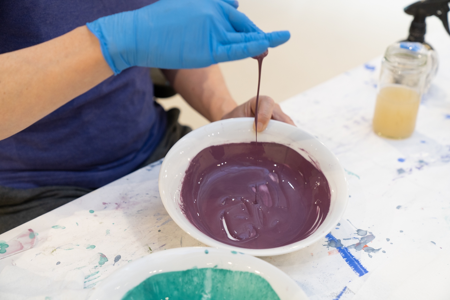 Mix a variety of colorful mineral pigments with glue.